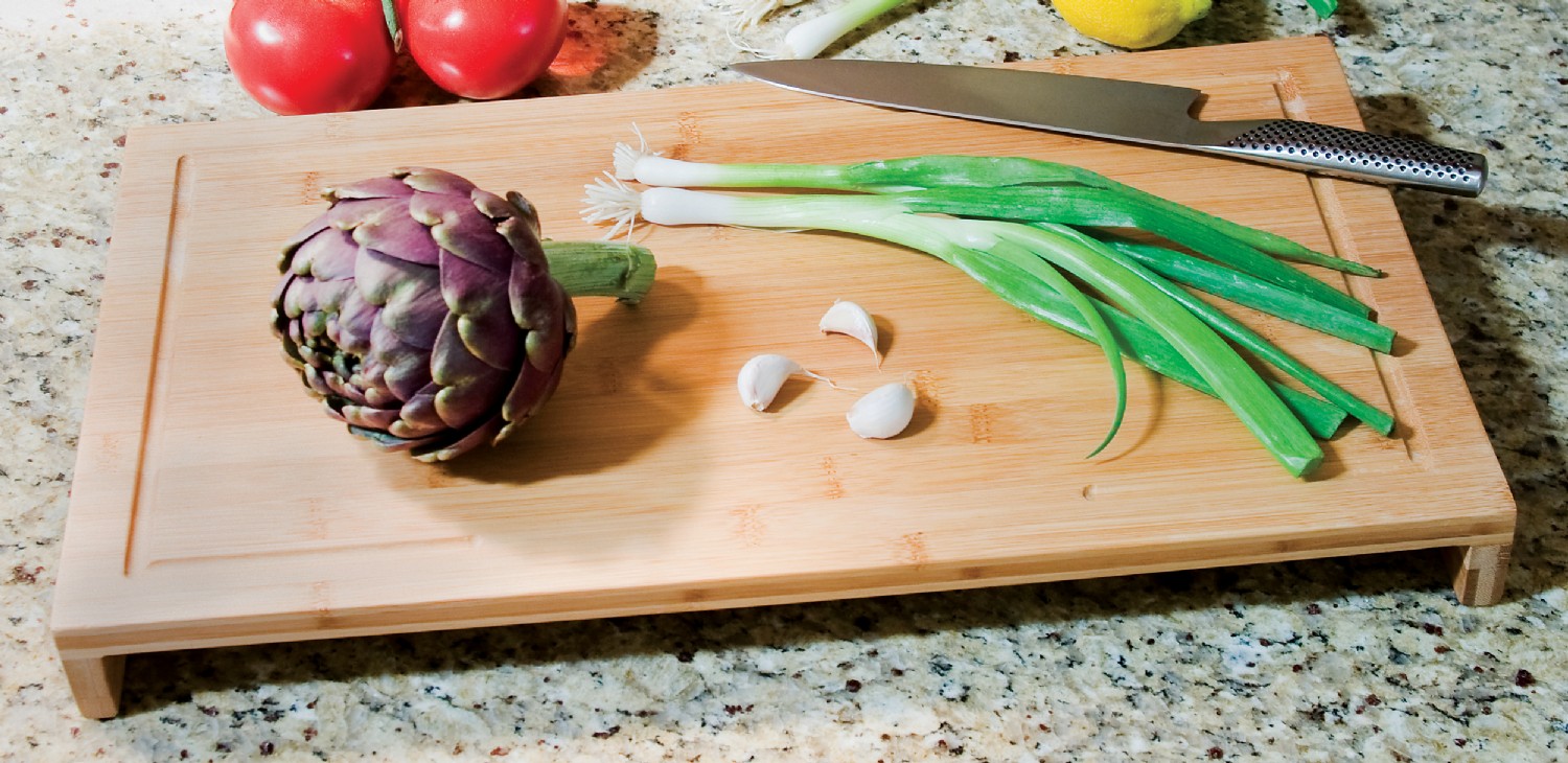 This Bamboo Stove Cover Cutting Board Gives You More Counter Space